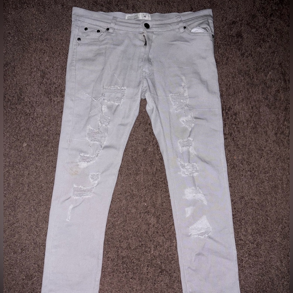 Grey ripped style skinny jeans